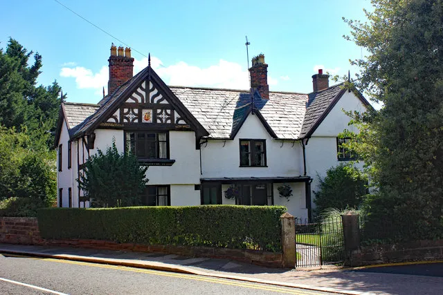 The Manor House, Tarporley — a 1585 Grade II timber-framed house typical of Cheshire's black-and-white heritage stock