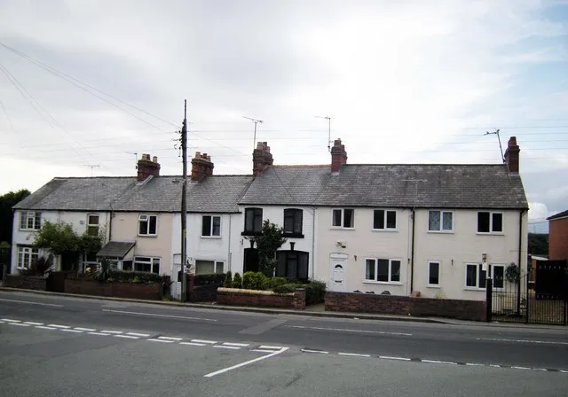 Woodbine Cottages, Northop Hall — an 1895 stone terrace on a quiet Flintshire village road