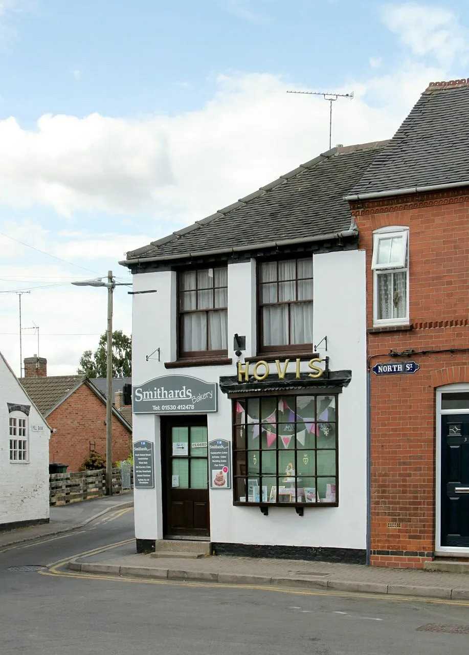 Traditional 19th century British shop front with classic bow window, Ashby-de-la-Zouch